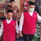 Petugas kepolisian melakukan olah tempat kejadian perkara.