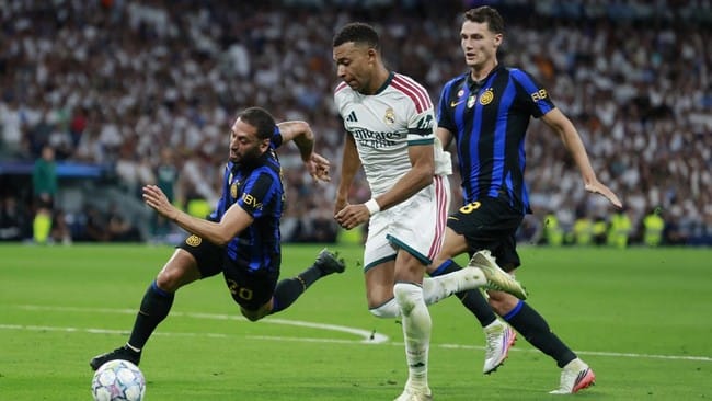 Kylian Mbappé mencetak gol saat Real Madrid mengalahkan Inter Milan 2-1 di Liga Champions.